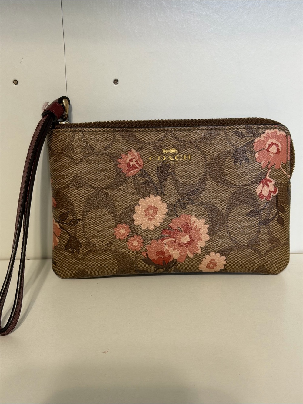 Coach Brown Floral Signature Wristlet with Pink Accents